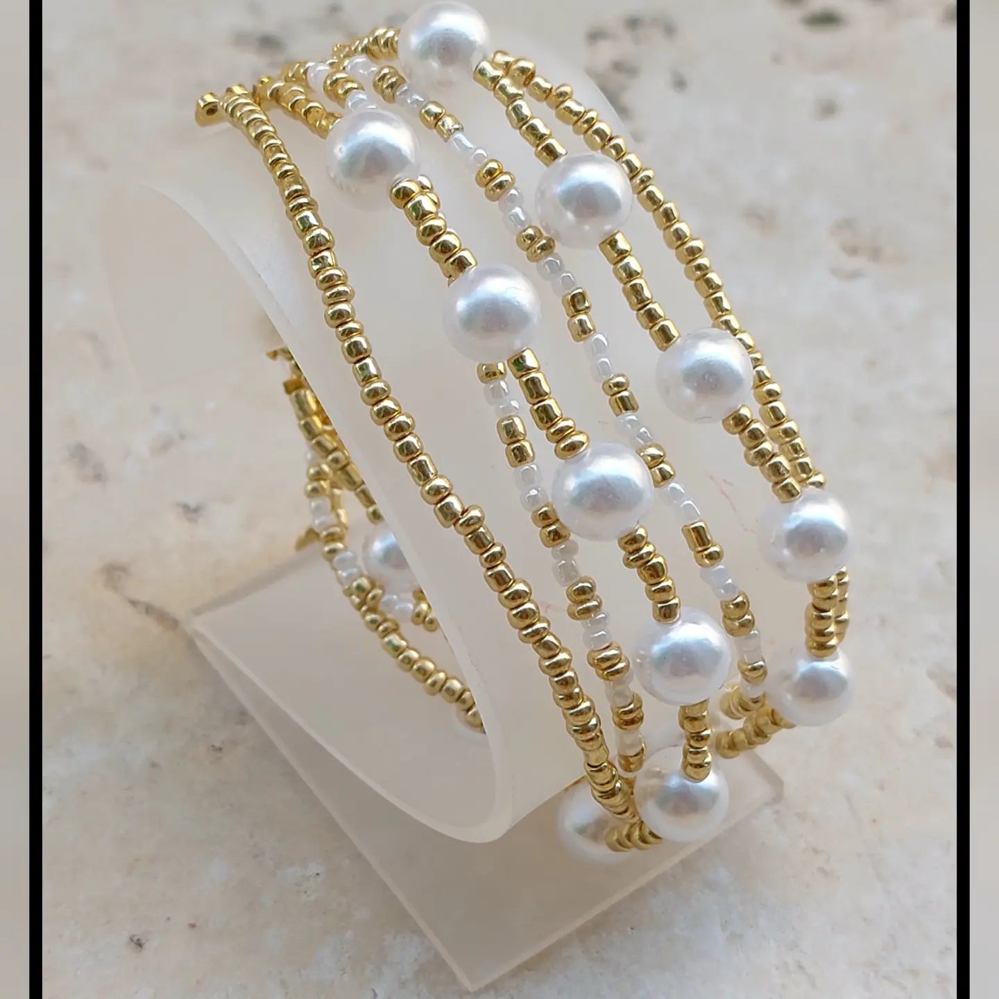 BRACCIALE PERLINE MULTIFILO